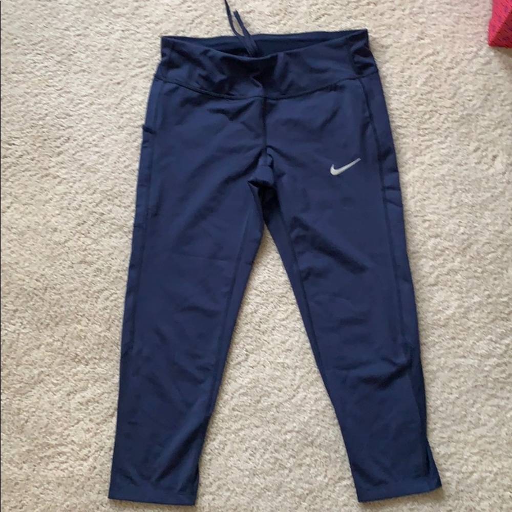 Nike Dri-Fit running crop pants. Size M